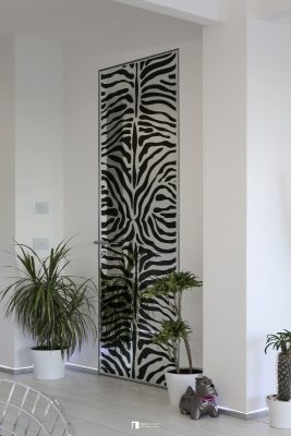 Invisible hinged door with zebra mirror